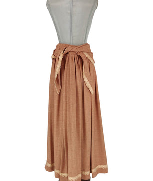 Noleggio gonna donna domestica marrone con passamaneria vintage