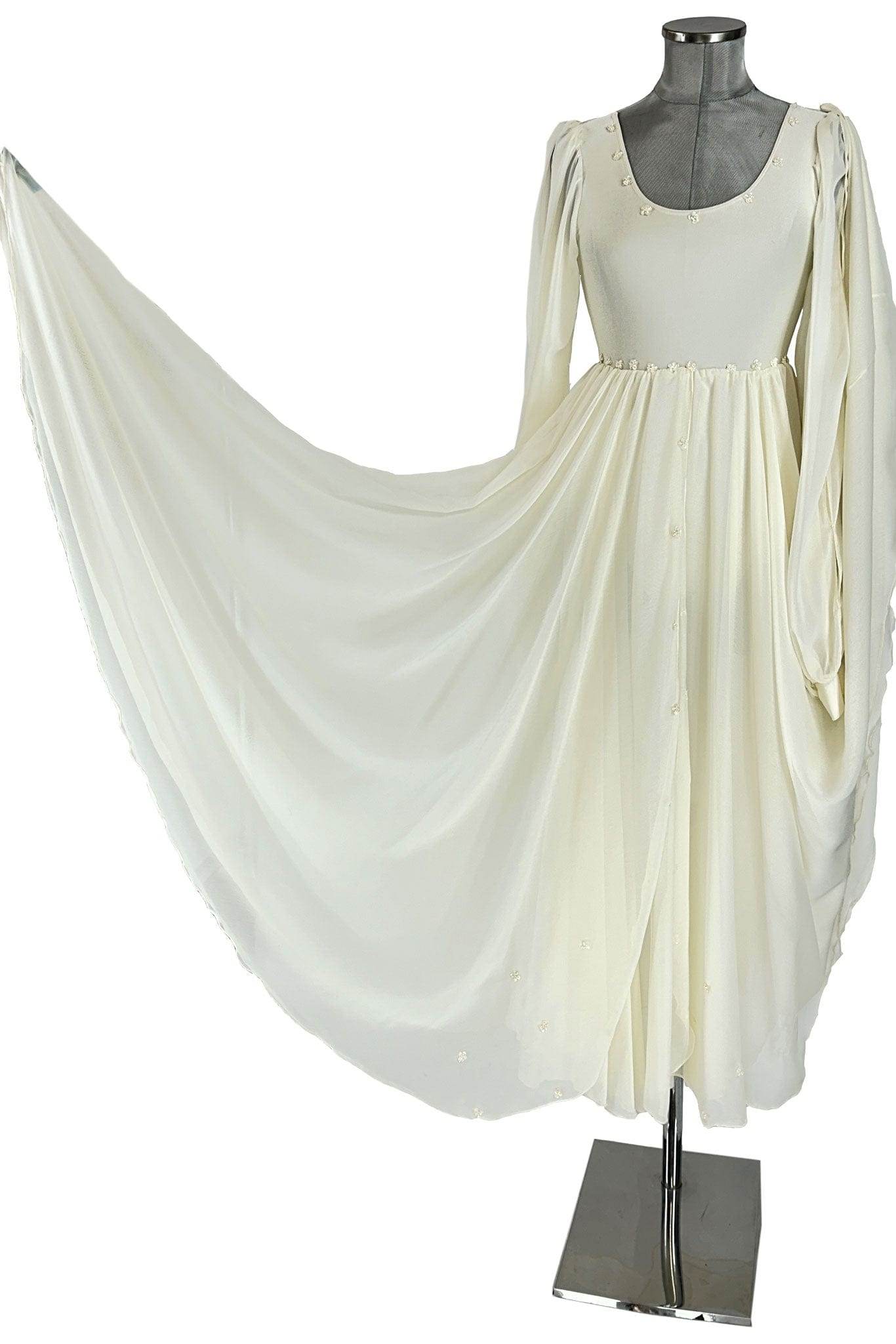 Noleggio Abito Bianco da Cerimonia con Maniche Fluttuanti - Eleganza Eterna