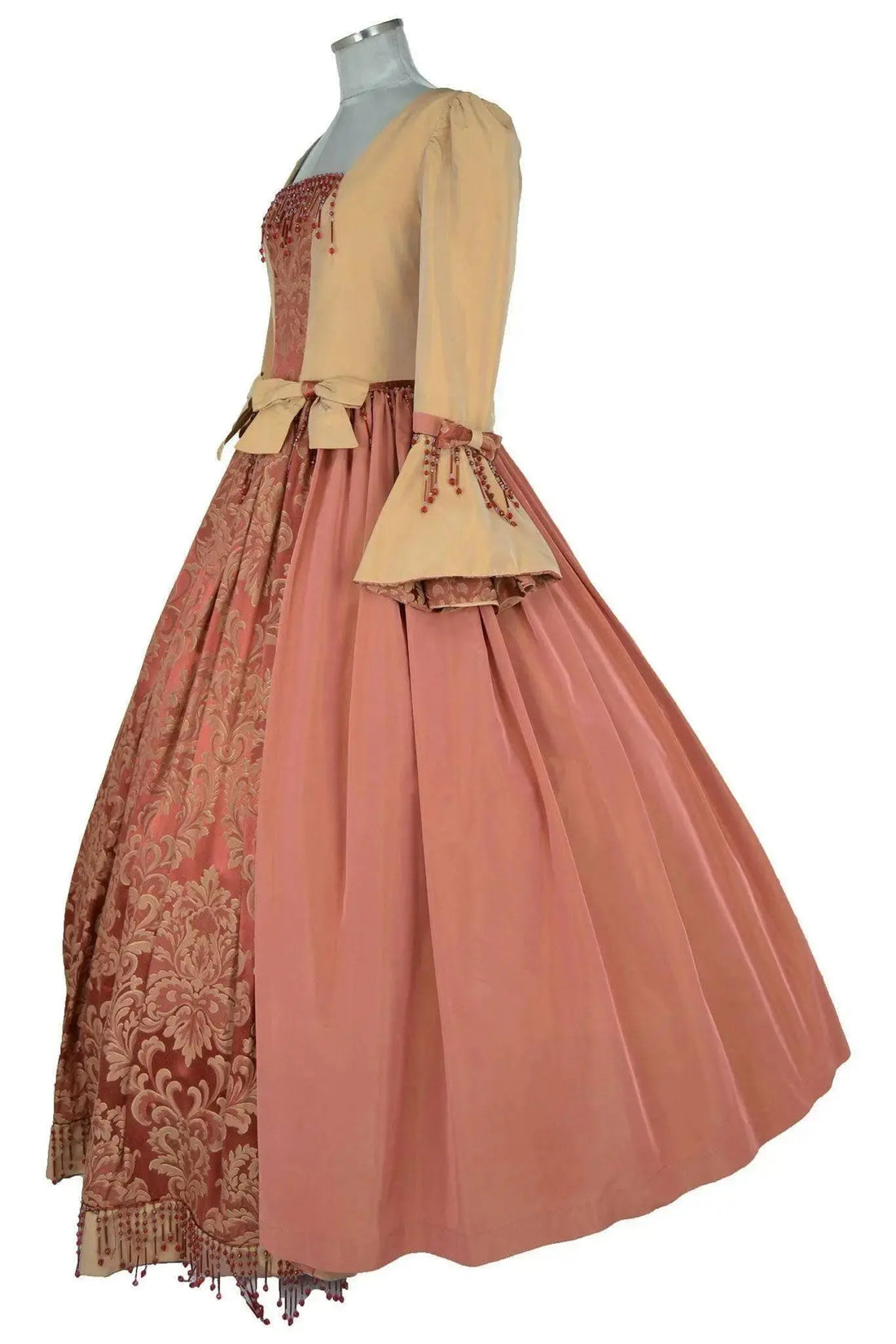 Noleggio abito storico donna rococò veneziano rosa antico con gonna a pieghe e fiocco laterale, vista laterale