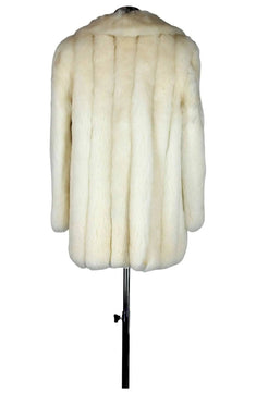 Noleggio giacca donna in pelliccia bianca