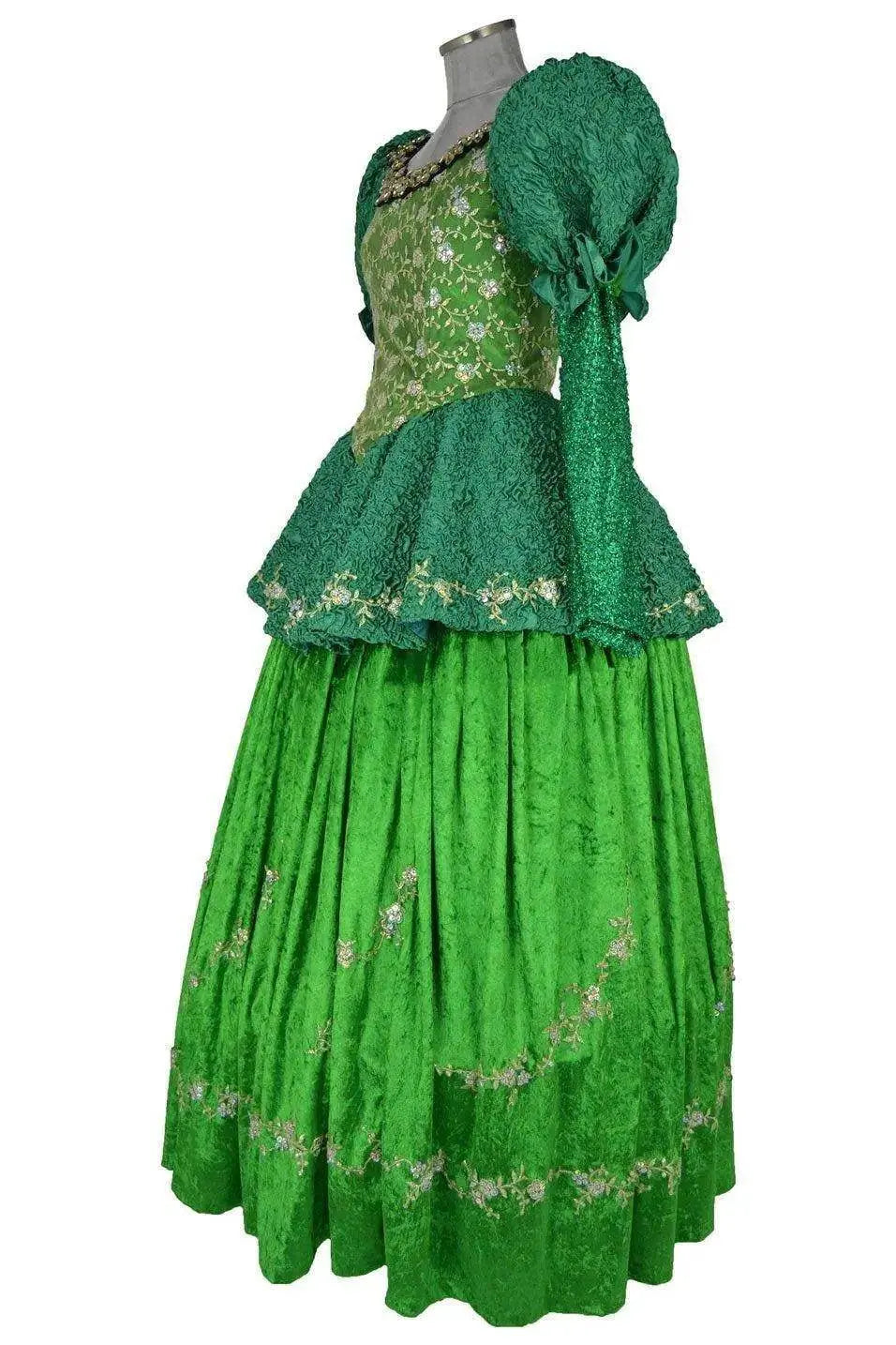 Noleggio abito storico Donna da principessa fiaba Ottocento verde smeraldo, vista laterale con manica a sbuffo e sopravveste